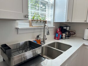 Private kitchen - Festive New Orleans Home! Close to French Quarter with Off-Street Parking (New Orleans)