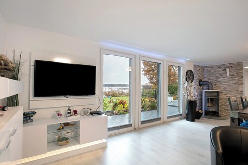 Ferienhaus 'Häuser' mit Seeblick, privater Terrasse und WLAN