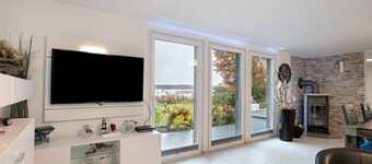 Holiday Home 'Häuser' with Lake View, Private Terrace, and Wi-Fi