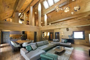Deluxe Chalet, Mountain View | Living area | LED TV, fireplace, heated floors - Fountainhead Hakuba (Hakuba)