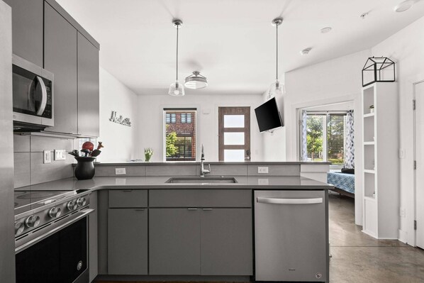 Fridge, microwave, dishwasher, coffee/tea maker