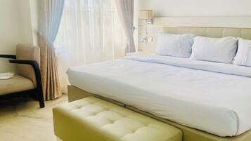 Premium bedding, down duvets, blackout curtains, free WiFi