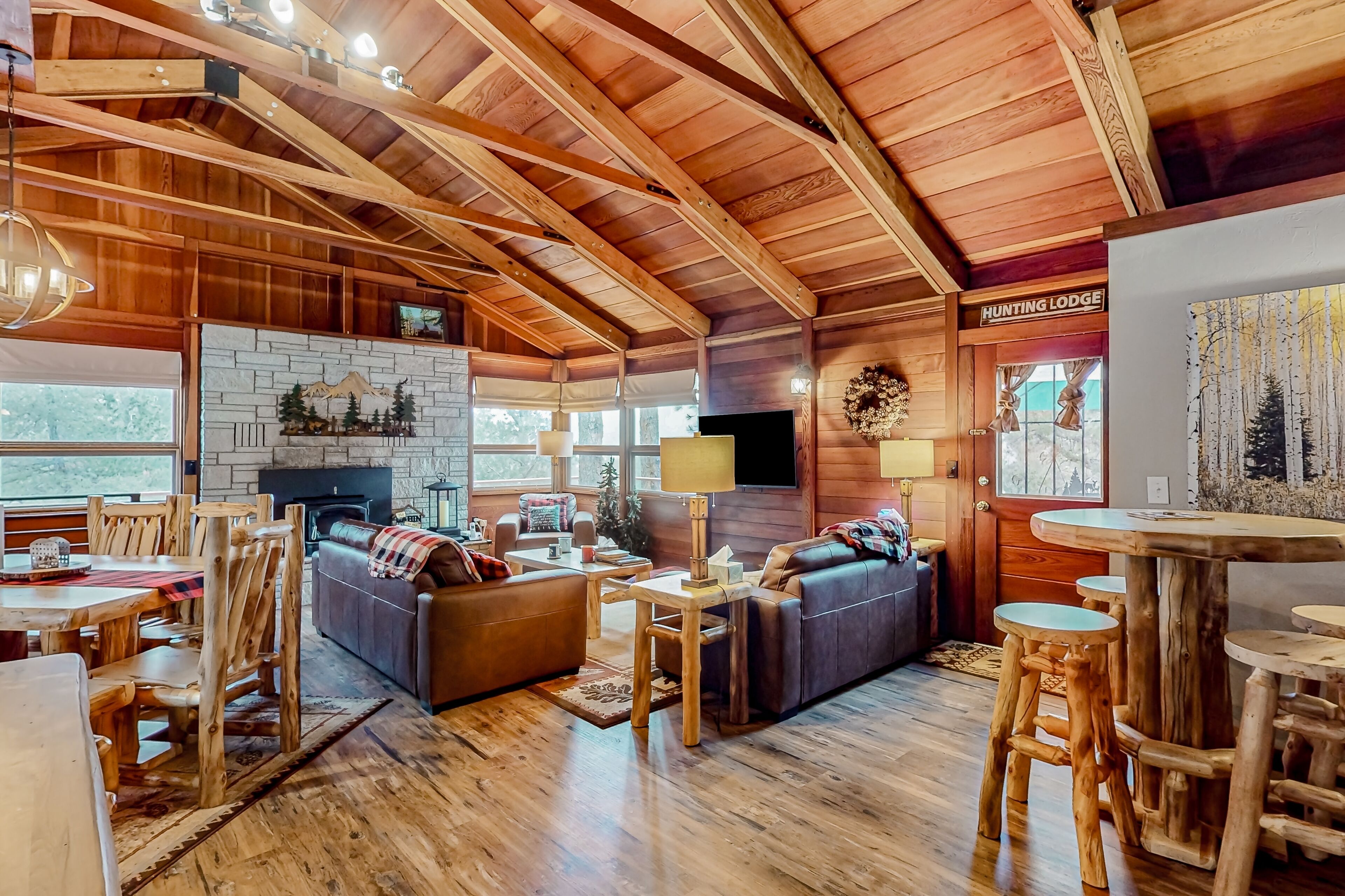 Remodeled wilderness retreat with game room, fireplaces, & deck