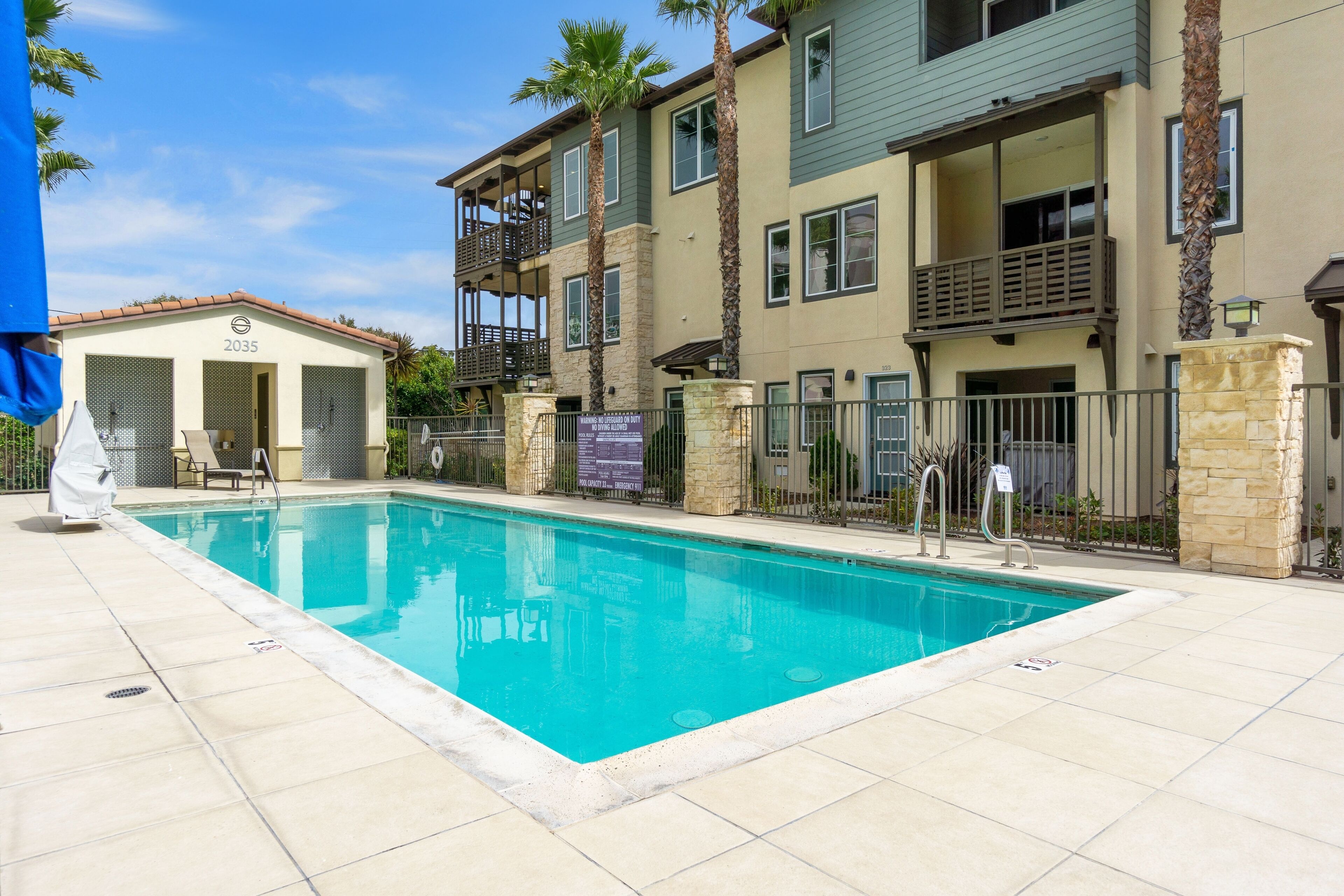 2-story home near the beach with rooftop terrace, hot tub, pool, streaming, W/D
