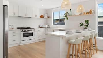 Coffee/tea maker, fridge, microwave, oven