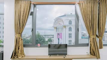 Panoramic Quadruple Room, City View | Minibar, iron/ironing board, free WiFi, bed sheets