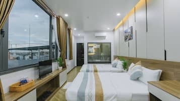 Panoramic Quadruple Room, City View | Minibar, iron/ironing board, free WiFi, bed sheets