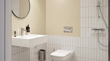 Shower, eco-friendly toiletries, hair dryer, towels