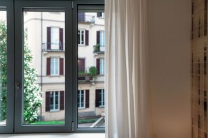 أغطية فراش متميزة وألحفة محشوة بالريش ومكواة/لوح كي وواي فاي مجانًا