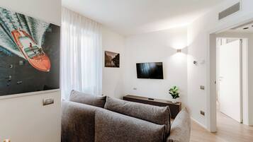 Apartment | Living area | 30-inch TV with digital channels