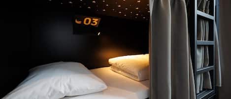 Premium bedding, laptop workspace, free WiFi, bed sheets