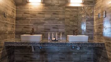 Executive Tent, River View | Bathroom | Shower, rainfall showerhead, free toiletries, bathrobes