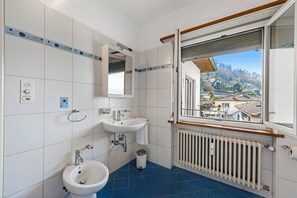Family Apartment, Multiple Bedrooms, Lakeside (Garden on the lake 1) | Bathroom | Combined shower/tub, bidet, towels, soap