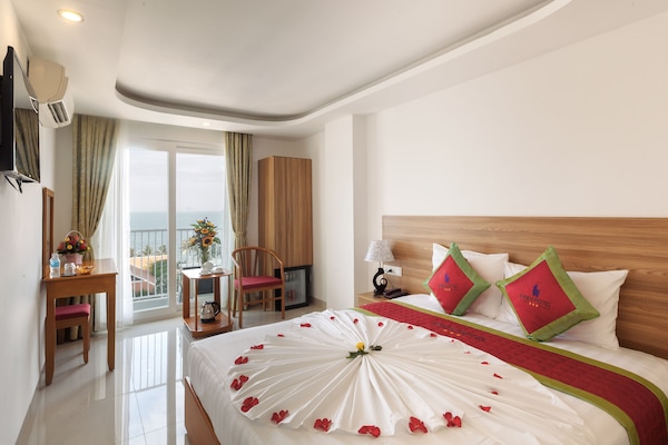 Deluxe Double or Twin Room, Balcony, Sea View | Premium bedding, down duvets, pillow-top beds, minibar