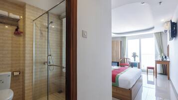 Deluxe Double or Twin Room, City View | Bathroom | Shower, rainfall showerhead, designer toiletries, hair dryer