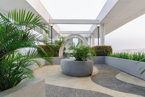 Rooftop terrace - Kamala by TwoSpaces Studio @Akasa Apartment (South Tangerang)