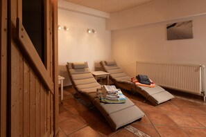 Relax in comfort with massage chairs and a convenient table for your personal items.