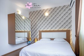 Habitacions insonoritzades, planxa i posts de planxar i wifi gratuïta 