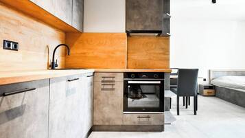 Fridge, oven, stovetop, dining tables