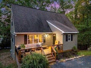 A two-story house with a porch, a staircase, and a front door. - Massanutten Mountaintop, Family Fun Awaits! Hot Tub, Arcade Games, Near Slopes (McGaheysville)