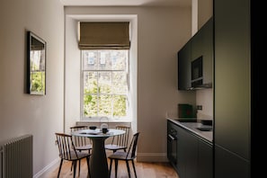 Luxury Apartment, City View | Private kitchen | Full-size fridge, microwave, oven, stovetop - 33 Castle Terrace (Edinburgh)