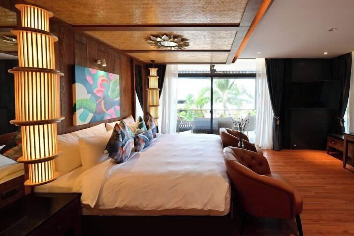 Luxe beddengoed, een minibar, een kluis op de kamer