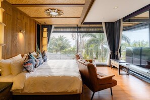 Deluxe kamer, 1 kingsize bed, niet-roken, uitzicht op zee | Luxe beddengoed, een minibar, een kluis op de kamer