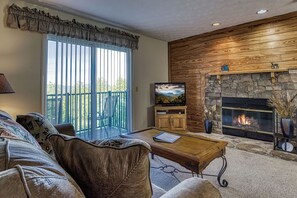 TV, fireplace - Mountain Escape , Pool Access, $560 tickets per paid day, Mountain Views!!! (Gatlinburg)