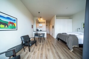 Departamento estándar, 1 habitación, vista al mar | Área de sala de estar