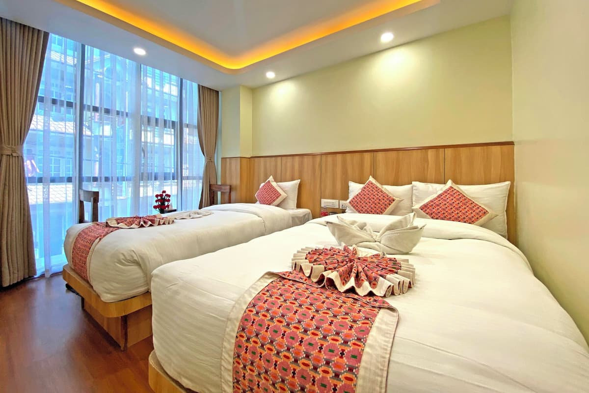Camera Deluxe con letto matrimoniale o 2 letti singoli | 1 camera, biancheria da letto di alta qualità, copriletto in piuma