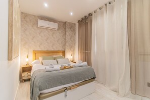 2 slaapkamers, een bureau, een strijkplank/strijkijzer, wifi