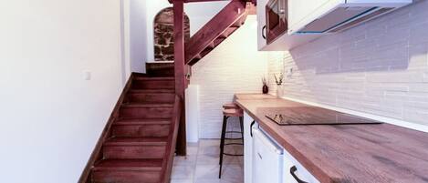 Fridge, microwave, stovetop, coffee/tea maker