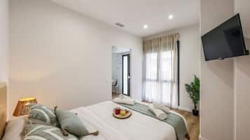 1 slaapkamer, een bureau, een strijkplank/strijkijzer, wifi