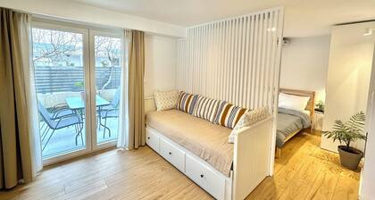 Minimalist Seaside Apartment with Patio and Parking - Blue Zone Homes