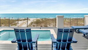 A poolside area with two chairs and a view of the ocean. - Viviana #12 | Luxury Gulf Front Home, Private Pool + Incredible Views! (Pensacola)
