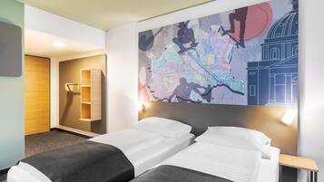 Desk, blackout drapes, soundproofing, free WiFi