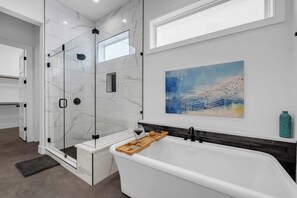 Shower, hair dryer, towels, shampoo