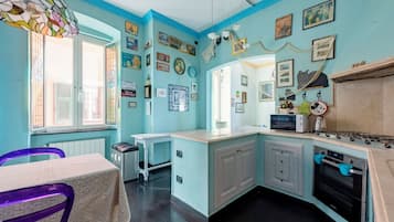 Family Apartment, 2 Bedrooms, Sea Facing (Genova Nervi Sea Front) | Private kitchen | Fridge, microwave, oven, stovetop