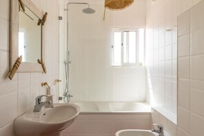 Hair dryer, towels, soap, shampoo