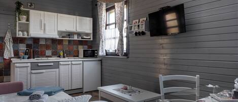 Fridge, microwave, cookware/dishes/utensils