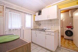 Fridge, stovetop, cookware/dishes/utensils