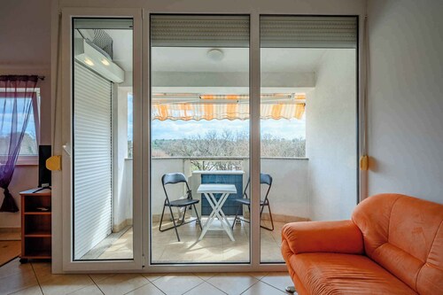 Holiday apartment mit Klimaanlage und Balkon