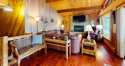 Lakefront home on South Two Lakes with lake views, lake access, firepit, & dock