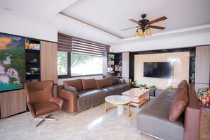 Phòng tập thể Gia đình | Khu phòng khách | TV 