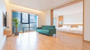 B,Room 603 [in-room Pool fee 50,000KRW,Ocean View,ElectricGrill BBQ,Netflix,Recomm for a big family] | Living area | 50-inch LCD TV with cable channels, Netflix, toys - Ilmare Fulvilla Pension Resort (Hwaseong)