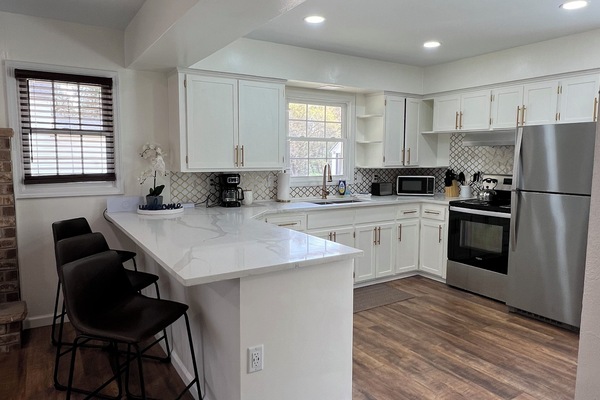 Frigorifero, microonde, forno, piano cottura