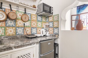 Fridge, microwave, coffee/tea maker, electric kettle