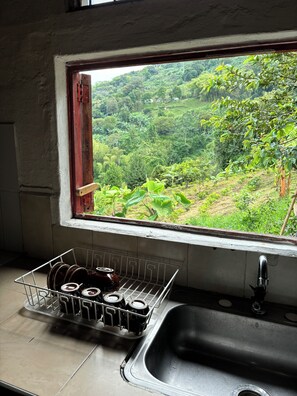 Shared kitchen - Finca La Macarena by Welttisch (Génova)