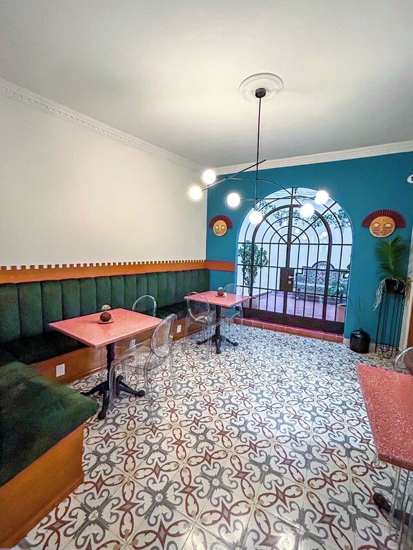 Enjoy a casual dining experience in our cozy space with comfortable booths and tables.