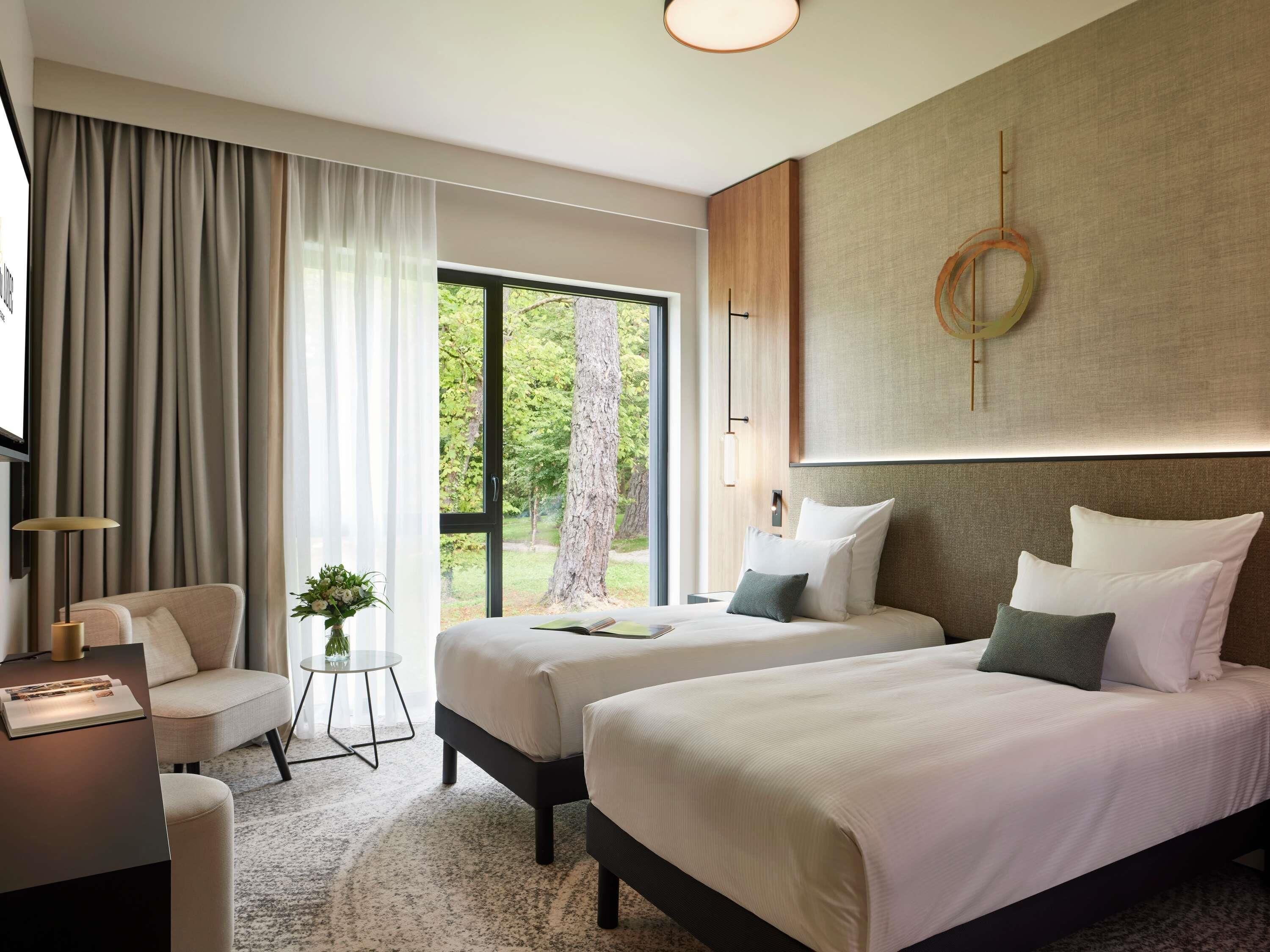 Camas con pillow-top y artículos del minibar gratis 